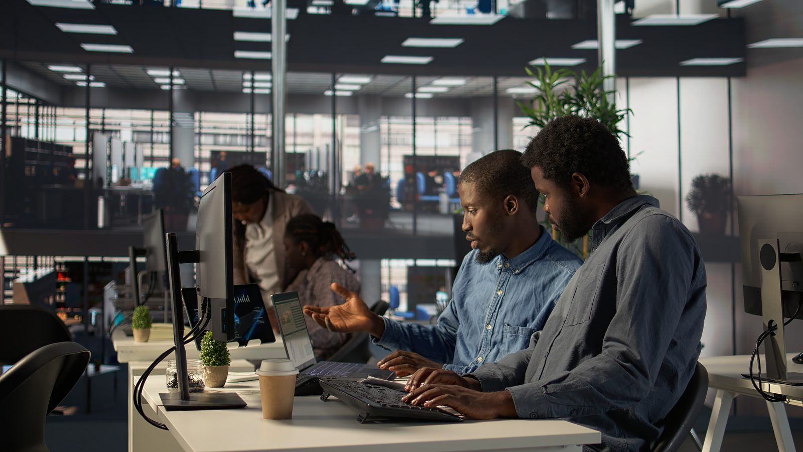 Afri-Silicon team collaborating on custom software strategy for East African businesses